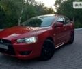 Червоний Міцубісі Lancer, об'ємом двигуна 2 л та пробігом 101 тис. км за 6999 $, фото 1 на Automoto.ua