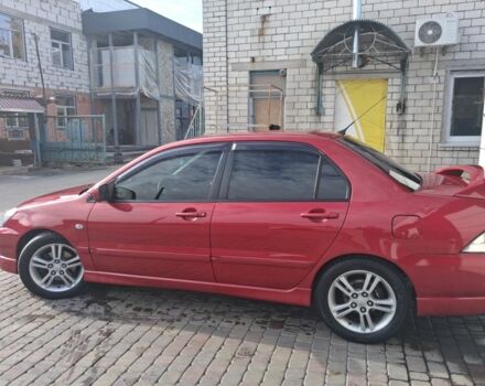 Мицубиси Лансер 2007 в Нежине на Automoto.ua Красный Мицубиси Лансер, объемом двигателя 2 л и пробегом 200 тыс. км за 5500 $, фото 2 на Automoto.ua