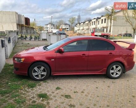 Красный Мицубиси Лансер, объемом двигателя 2 л и пробегом 198 тыс. км за 5700 $, фото 2 на Automoto.ua