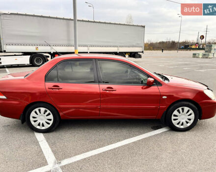 Червоний Міцубісі Lancer, об'ємом двигуна 1.6 л та пробігом 194 тис. км за 5500 $, фото 17 на Automoto.ua