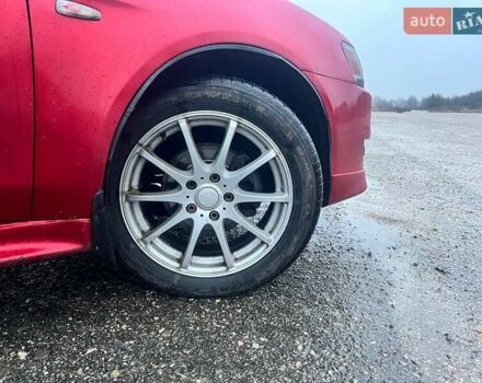 Красный Мицубиси Лансер, объемом двигателя 1.5 л и пробегом 241 тыс. км за 5850 $, фото 14 на Automoto.ua