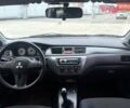 Красный Мицубиси Лансер, объемом двигателя 1.59 л и пробегом 212 тыс. км за 5490 $, фото 11 на Automoto.ua