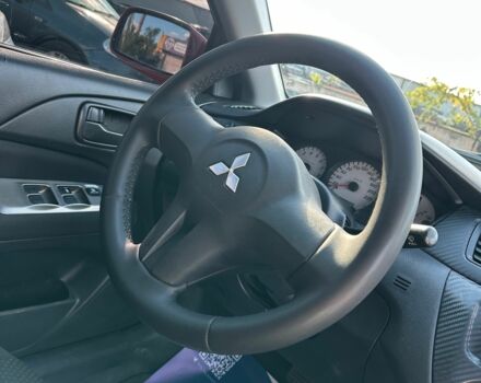 Красный Мицубиси Лансер, объемом двигателя 1.6 л и пробегом 230 тыс. км за 5300 $, фото 13 на Automoto.ua