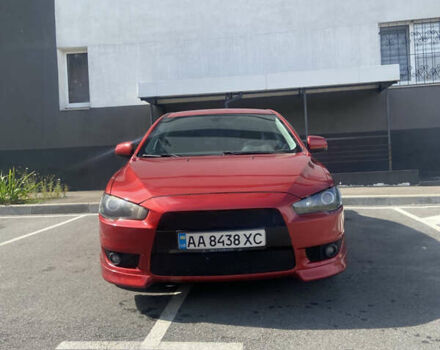 Червоний Міцубісі Lancer, об'ємом двигуна 2 л та пробігом 251 тис. км за 5900 $, фото 1 на Automoto.ua