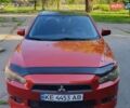 Красный Мицубиси Лансер, объемом двигателя 1.5 л и пробегом 157 тыс. км за 5150 $, фото 1 на Automoto.ua