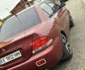 Красный Мицубиси Лансер, объемом двигателя 1.6 л и пробегом 151 тыс. км за 3150 $, фото 7 на Automoto.ua