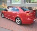 Червоний Міцубісі Lancer, об'ємом двигуна 2 л та пробігом 156 тис. км за 6999 $, фото 7 на Automoto.ua