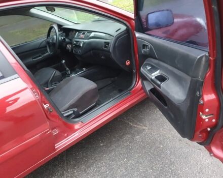 Красный Мицубиси Лансер, объемом двигателя 1.6 л и пробегом 250 тыс. км за 3700 $, фото 9 на Automoto.ua