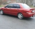 Красный Мицубиси Лансер, объемом двигателя 1.6 л и пробегом 250 тыс. км за 3700 $, фото 5 на Automoto.ua