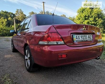 Червоний Міцубісі Lancer, об'ємом двигуна 1.6 л та пробігом 173 тис. км за 5500 $, фото 11 на Automoto.ua