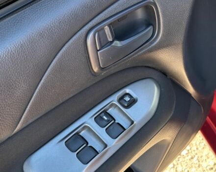 Красный Мицубиси Лансер, объемом двигателя 1.6 л и пробегом 230 тыс. км за 5300 $, фото 14 на Automoto.ua