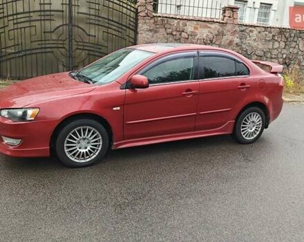 Червоний Міцубісі Lancer, об'ємом двигуна 2 л та пробігом 186 тис. км за 5600 $, фото 6 на Automoto.ua