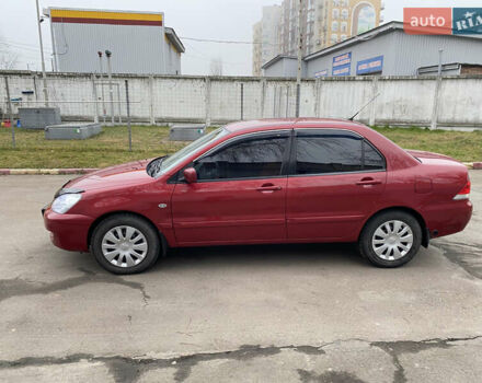 Червоний Міцубісі Lancer, об'ємом двигуна 1.58 л та пробігом 151 тис. км за 5600 $, фото 3 на Automoto.ua