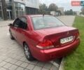 Червоний Міцубісі Lancer, об'ємом двигуна 1.6 л та пробігом 282 тис. км за 5000 $, фото 1 на Automoto.ua