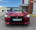 Красный Мицубиси Лансер, объемом двигателя 2 л и пробегом 260 тыс. км за 6600 $, фото 1 на Automoto.ua