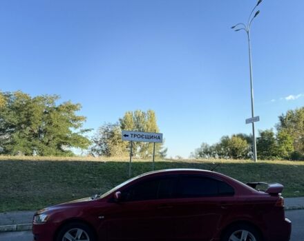 Красный Мицубиси Лансер, объемом двигателя 2 л и пробегом 307 тыс. км за 6499 $, фото 2 на Automoto.ua