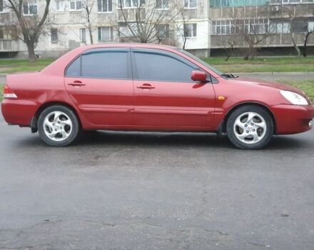 Красный Мицубиси Лансер, объемом двигателя 1.6 л и пробегом 250 тыс. км за 3700 $, фото 3 на Automoto.ua