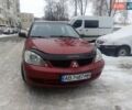 Красный Мицубиси Лансер, объемом двигателя 1.6 л и пробегом 300 тыс. км за 2999 $, фото 1 на Automoto.ua