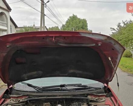 Червоний Міцубісі Lancer, об'ємом двигуна 2 л та пробігом 187 тис. км за 5600 $, фото 28 на Automoto.ua