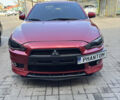Червоний Міцубісі Lancer, об'ємом двигуна 2 л та пробігом 254 тис. км за 7500 $, фото 1 на Automoto.ua