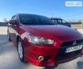 Червоний Міцубісі Lancer, об'ємом двигуна 2 л та пробігом 293 тис. км за 7350 $, фото 12 на Automoto.ua