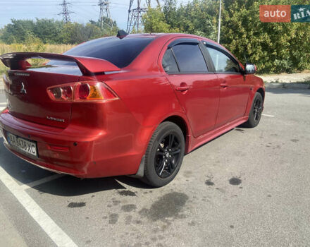 Червоний Міцубісі Lancer, об'ємом двигуна 2 л та пробігом 251 тис. км за 5900 $, фото 7 на Automoto.ua