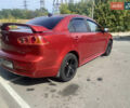 Червоний Міцубісі Lancer, об'ємом двигуна 2 л та пробігом 251 тис. км за 5900 $, фото 7 на Automoto.ua