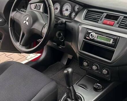 Красный Мицубиси Лансер, объемом двигателя 1.6 л и пробегом 176 тыс. км за 4300 $, фото 12 на Automoto.ua