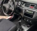 Красный Мицубиси Лансер, объемом двигателя 1.6 л и пробегом 176 тыс. км за 4300 $, фото 12 на Automoto.ua