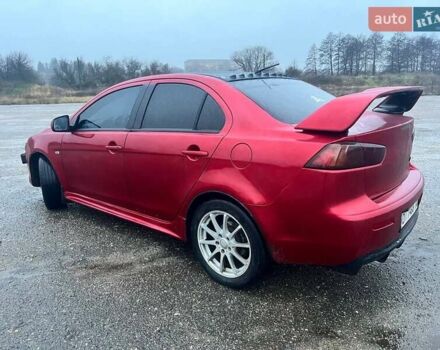 Красный Мицубиси Лансер, объемом двигателя 1.5 л и пробегом 241 тыс. км за 5850 $, фото 11 на Automoto.ua