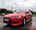 Червоний Міцубісі Lancer, об'ємом двигуна 2 л та пробігом 187 тис. км за 5000 $, фото 1 на Automoto.ua