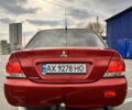 Червоний Міцубісі Lancer, об'ємом двигуна 1.6 л та пробігом 194 тис. км за 5500 $, фото 18 на Automoto.ua