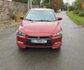 Червоний Міцубісі Lancer, об'ємом двигуна 2 л та пробігом 186 тис. км за 5600 $, фото 5 на Automoto.ua