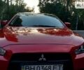 Червоний Міцубісі Lancer, об'ємом двигуна 2 л та пробігом 101 тис. км за 6999 $, фото 24 на Automoto.ua