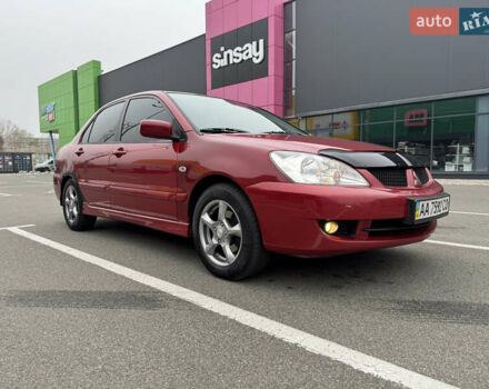 Красный Мицубиси Лансер, объемом двигателя 1.58 л и пробегом 285 тыс. км за 3650 $, фото 2 на Automoto.ua