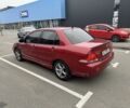 Красный Мицубиси Лансер, объемом двигателя 1.6 л и пробегом 285 тыс. км за 3650 $, фото 7 на Automoto.ua