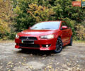 Червоний Міцубісі Lancer, об'ємом двигуна 2 л та пробігом 122 тис. км за 7200 $, фото 1 на Automoto.ua