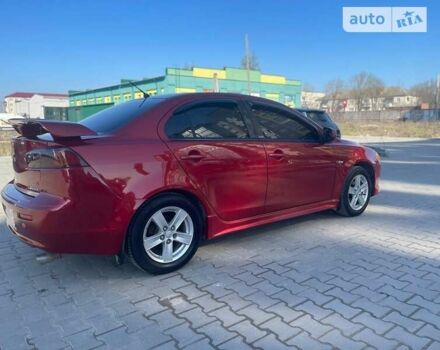 Червоний Міцубісі Lancer, об'ємом двигуна 2 л та пробігом 293 тис. км за 7350 $, фото 10 на Automoto.ua