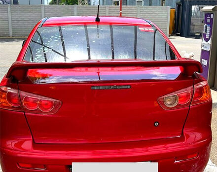 Красный Мицубиси Лансер, объемом двигателя 1.5 л и пробегом 145 тыс. км за 6500 $, фото 1 на Automoto.ua