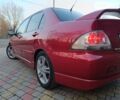 Червоний Міцубісі Lancer, об'ємом двигуна 2 л та пробігом 265 тис. км за 4300 $, фото 6 на Automoto.ua