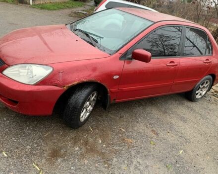 Червоний Міцубісі Lancer, об'ємом двигуна 1.6 л та пробігом 300 тис. км за 2799 $, фото 2 на Automoto.ua