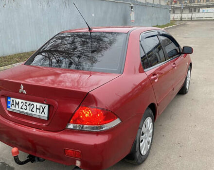 Червоний Міцубісі Lancer, об'ємом двигуна 1.58 л та пробігом 151 тис. км за 5600 $, фото 7 на Automoto.ua