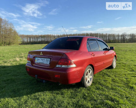 Червоний Міцубісі Lancer, об'ємом двигуна 1.6 л та пробігом 130 тис. км за 5800 $, фото 5 на Automoto.ua