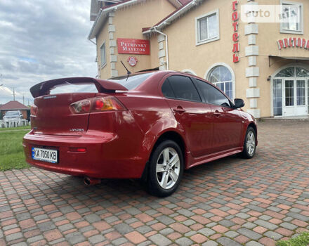 Червоний Міцубісі Lancer, об'ємом двигуна 2 л та пробігом 191 тис. км за 7500 $, фото 5 на Automoto.ua