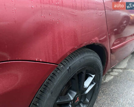 Красный Мицубиси Лансер, объемом двигателя 1.58 л и пробегом 269 тыс. км за 3899 $, фото 8 на Automoto.ua