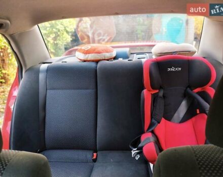 Красный Мицубиси Лансер, объемом двигателя 1.6 л и пробегом 214 тыс. км за 5000 $, фото 8 на Automoto.ua