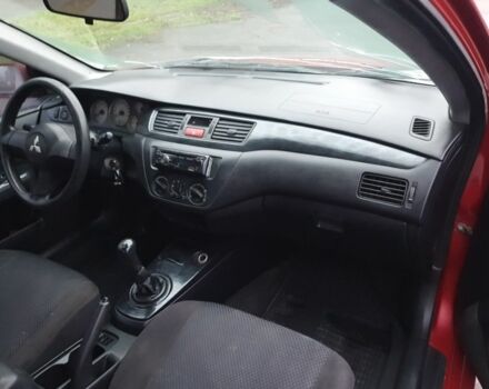 Красный Мицубиси Лансер, объемом двигателя 1.6 л и пробегом 250 тыс. км за 3700 $, фото 8 на Automoto.ua