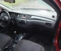 Красный Мицубиси Лансер, объемом двигателя 1.6 л и пробегом 250 тыс. км за 3700 $, фото 8 на Automoto.ua