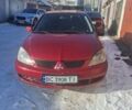 Красный Мицубиси Лансер, объемом двигателя 1.58 л и пробегом 240 тыс. км за 2800 $, фото 1 на Automoto.ua