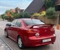 Червоний Міцубісі Lancer, об'ємом двигуна 2 л та пробігом 225 тис. км за 5650 $, фото 1 на Automoto.ua